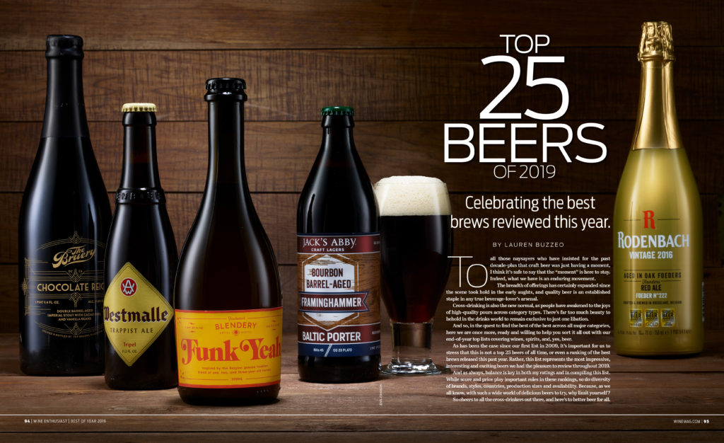 A spread of bottled beers named the top beers of the year by Wine Enthusiast Magazine, featuring Jack's Abby's Bourbon Barrel-aged Framinghammer in the center.
